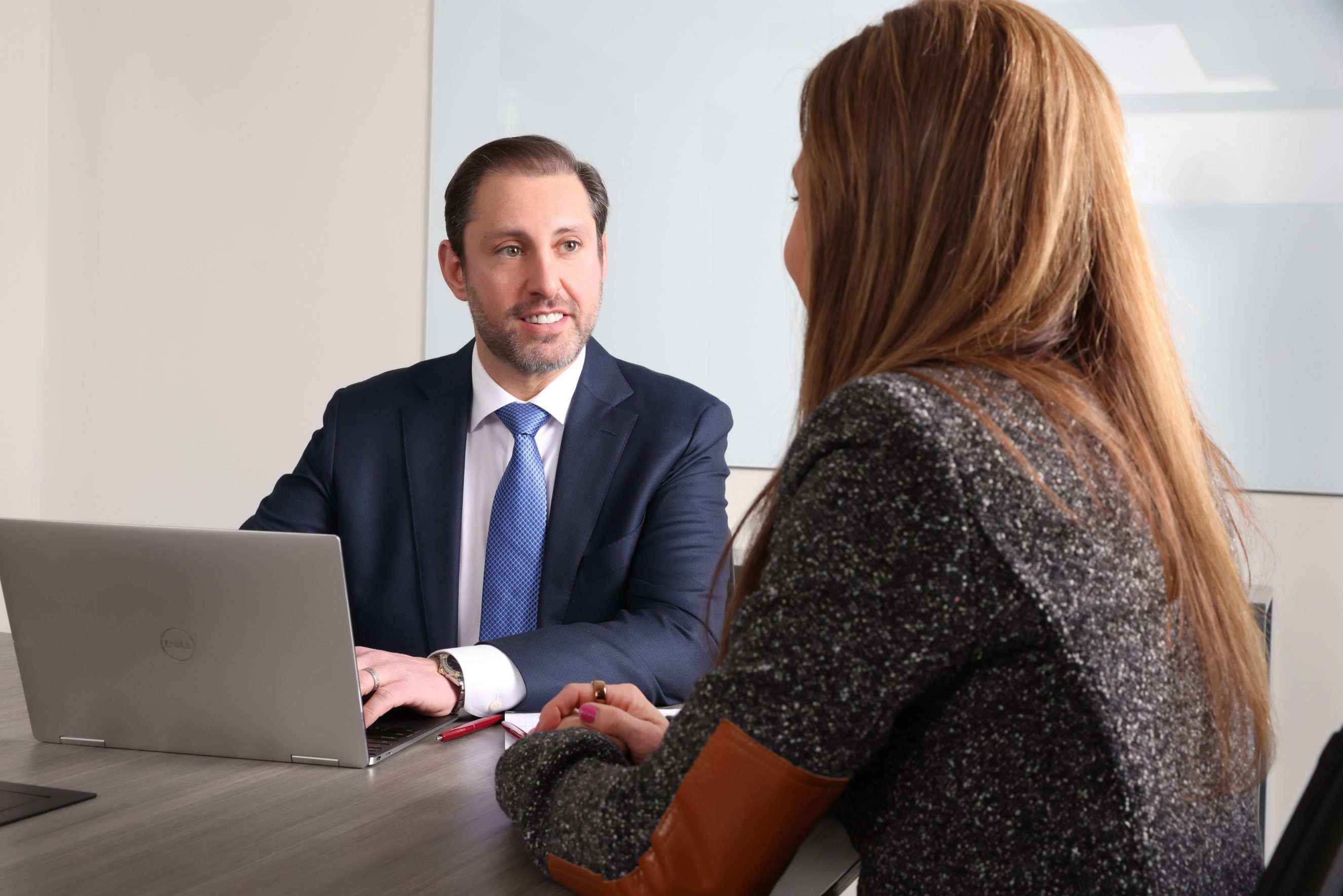 James B. Sarnoff meeting with a client